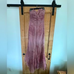 René Ruiz Collection. Size 6 strapless twisted coupe. Pleated sweetheart neck